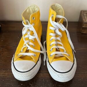 Yellow high top converse